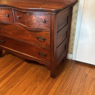 LOT 79: Anique Tiger Oak Drawer Dresser