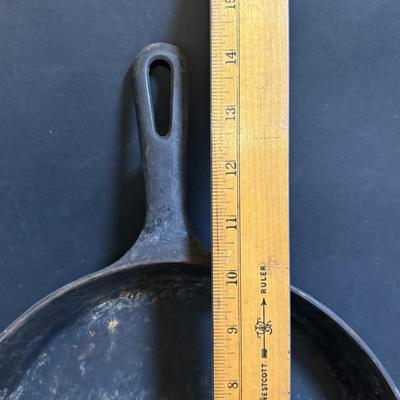LOT 88: Griswold Cast Iron Pan, Cast Iron Corn & Gingerbread Man Baking Molds, Small Cast Iron Fry Pan & Tin Muffin Pan