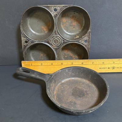 LOT 88: Griswold Cast Iron Pan, Cast Iron Corn & Gingerbread Man Baking Molds, Small Cast Iron Fry Pan & Tin Muffin Pan