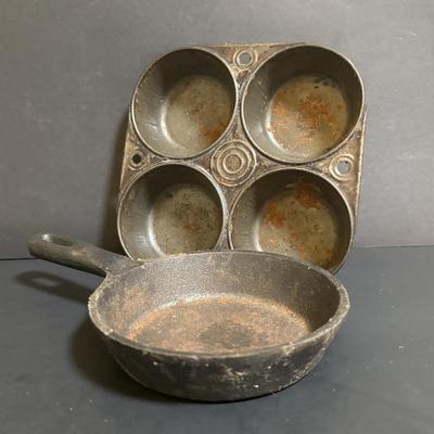 LOT 88: Griswold Cast Iron Pan, Cast Iron Corn & Gingerbread Man Baking Molds, Small Cast Iron Fry Pan & Tin Muffin Pan