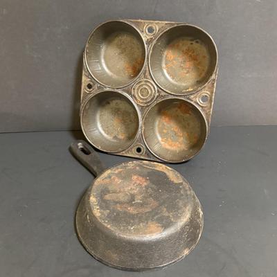 LOT 88: Griswold Cast Iron Pan, Cast Iron Corn & Gingerbread Man Baking Molds, Small Cast Iron Fry Pan & Tin Muffin Pan