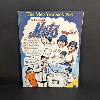 LOT 94: Mets & Phillies Collection: Yearbooks, Ticket Stub, Mug, Vintage Rule Book along with APBA Game Card Packets