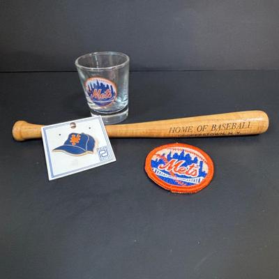 LOT 94: Mets & Phillies Collection: Yearbooks, Ticket Stub, Mug, Vintage Rule Book along with APBA Game Card Packets