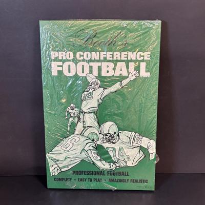 LOT 93: Booth's Pro Conference Football Game - UNOPENED