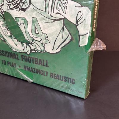 LOT 93: Booth's Pro Conference Football Game - UNOPENED