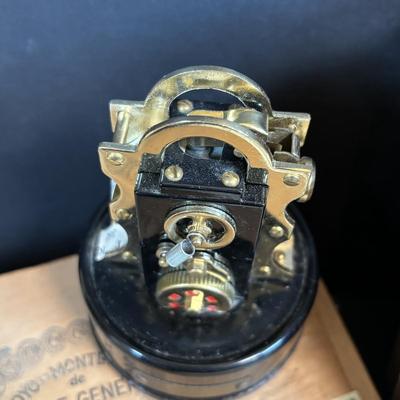 LOT 101: Vintage Edison Stock Exchange Ticker Tape Lighter w/Glass Dome, Holts Cigar Company Ashtrays, Pipe Holders & More