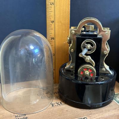 LOT 101: Vintage Edison Stock Exchange Ticker Tape Lighter w/Glass Dome, Holts Cigar Company Ashtrays, Pipe Holders & More