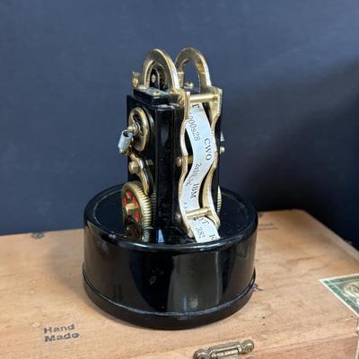 LOT 101: Vintage Edison Stock Exchange Ticker Tape Lighter w/Glass Dome, Holts Cigar Company Ashtrays, Pipe Holders & More
