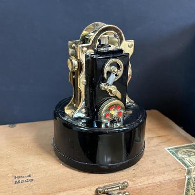 LOT 101: Vintage Edison Stock Exchange Ticker Tape Lighter w/Glass Dome, Holts Cigar Company Ashtrays, Pipe Holders & More