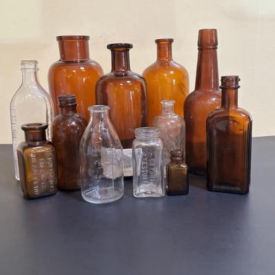 LOT 103: Vintage Brown & Clear Bottle Collection