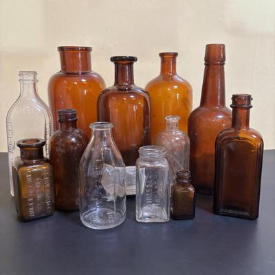 LOT 103: Vintage Brown & Clear Bottle Collection