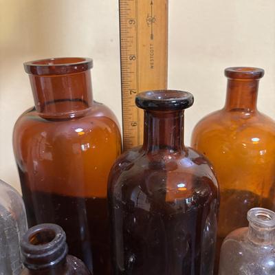 LOT 103: Vintage Brown & Clear Bottle Collection