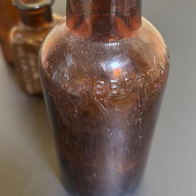 LOT 103: Vintage Brown & Clear Bottle Collection