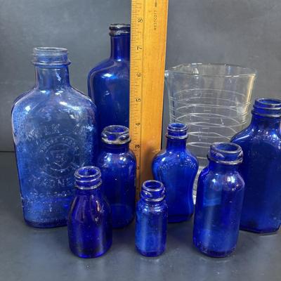 LOT 104: Vintage Cobalt Blue Bottles & Clear Glass Beaker