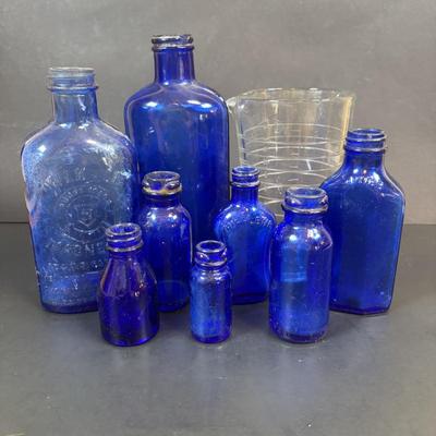 LOT 104: Vintage Cobalt Blue Bottles & Clear Glass Beaker