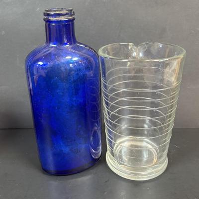 LOT 104: Vintage Cobalt Blue Bottles & Clear Glass Beaker