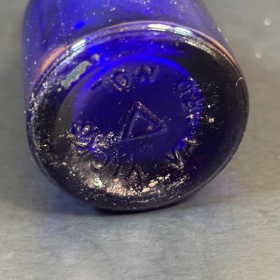 LOT 104: Vintage Cobalt Blue Bottles & Clear Glass Beaker
