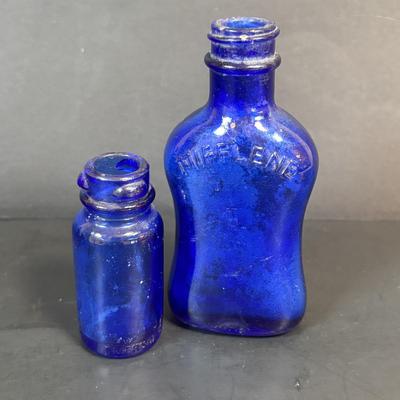 LOT 104: Vintage Cobalt Blue Bottles & Clear Glass Beaker