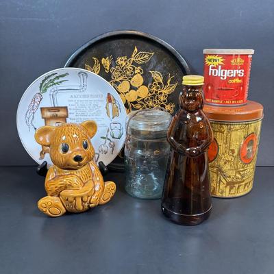 LOT 105: Vintage Kitchen: Mrs. Butterworth Syrup Bottle, Kitchen Prayer Plate, Tins, Atlas Canning Jar & Ceramic Bear Honey Pot
