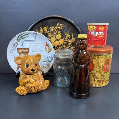 LOT 105: Vintage Kitchen: Mrs. Butterworth Syrup Bottle, Kitchen Prayer Plate, Tins, Atlas Canning Jar & Ceramic Bear Honey Pot