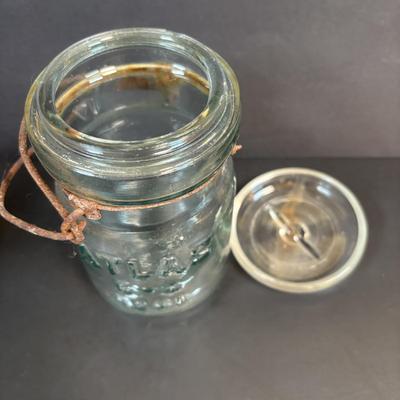 LOT 105: Vintage Kitchen: Mrs. Butterworth Syrup Bottle, Kitchen Prayer Plate, Tins, Atlas Canning Jar & Ceramic Bear Honey Pot