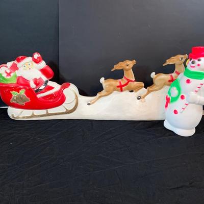 LOT251: Vintage Christmas Holiday Plastic Blow. Mold Lighted Decorations - Santa’s Sleigh by Union Products and Snowma by Empire 1966