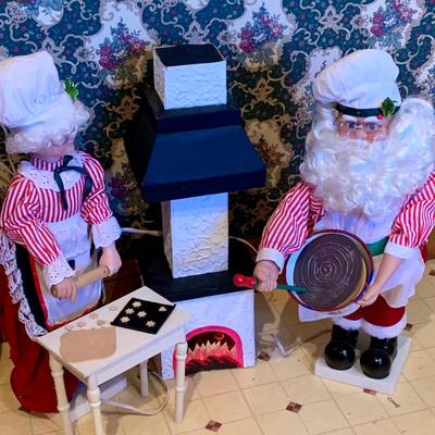 LOT 254: Animatronic Santa and Mrs Claus Baking Cookies Including Table and Lighted Oven In Original Box