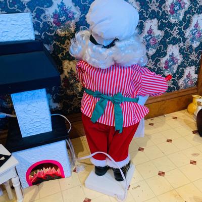 LOT 254: Animatronic Santa and Mrs Claus Baking Cookies Including Table and Lighted Oven In Original Box