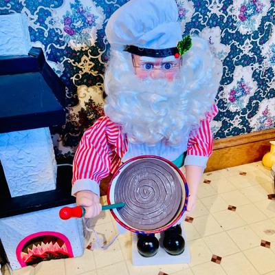 LOT 254: Animatronic Santa and Mrs Claus Baking Cookies Including Table and Lighted Oven In Original Box