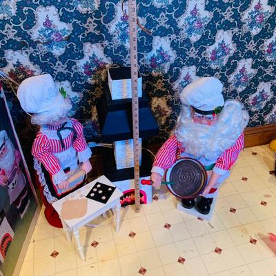 LOT 254: Animatronic Santa and Mrs Claus Baking Cookies Including Table and Lighted Oven In Original Box