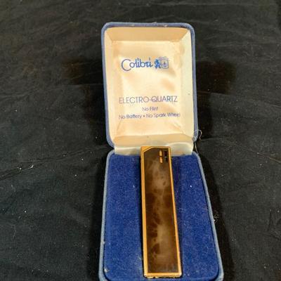LOT 268: Collection of Vintage Ashtrays and Colibri Electro-Quarts Lighter In Original Box