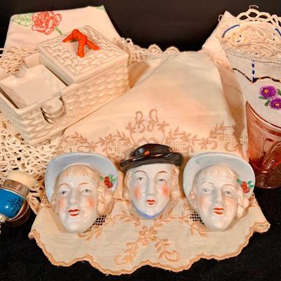 LOT 270: Set of Three (3) Vintage Art Deco Lady Head Ceramic Wall Pockets from Japan, Ceramic Cigarette Box and Ashtrays Linens, Make-up...