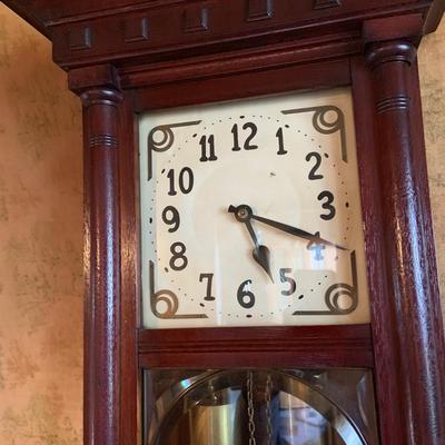 LOT 271: Sopra Wood Wall. Clock with Beveled Glass Door