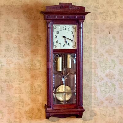 LOT 271: Sopra Wood Wall. Clock with Beveled Glass Door