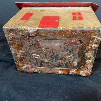 LOT 284: Large Glass Bottle Bank and Cast Iron House Bank