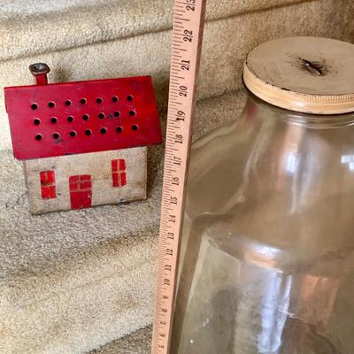 LOT 284: Large Glass Bottle Bank and Cast Iron House Bank