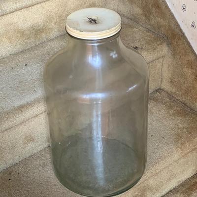 LOT 284: Large Glass Bottle Bank and Cast Iron House Bank
