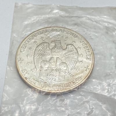 LOT 311: Two 1972 U.S. Constellation Centennial Diamond Jubilee Silver Medals