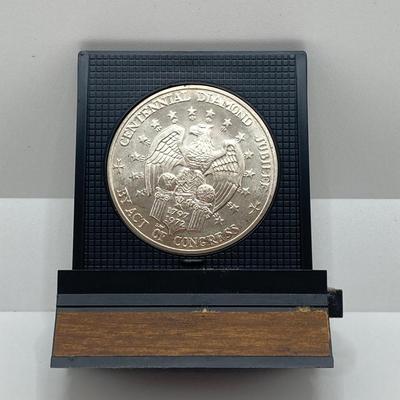LOT 312: Two 1972 U.S. Constellation Centennial Diamond Jubilee Silver Medals in Protective Cases