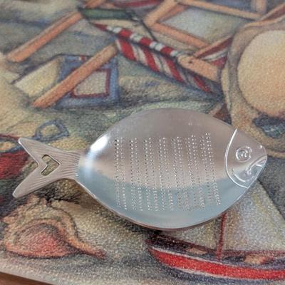 LOT 55K: Beach Themed Collection, 2 Fluted Champagne Glasses, Serving Tray, Utensils, Glass Cutting Board, Kitchen Towels And Whimsical...
