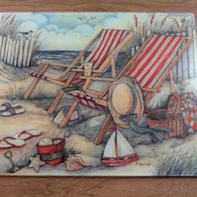 LOT 55K: Beach Themed Collection, 2 Fluted Champagne Glasses, Serving Tray, Utensils, Glass Cutting Board, Kitchen Towels And Whimsical...