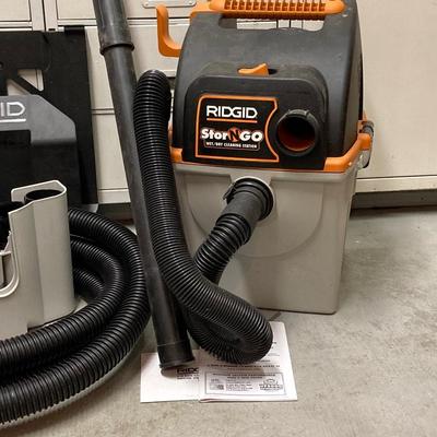 LOT 66U: Ridgid Stor N Go Vacuum Model WD5500 0, Eureka Powerline Mightymite Vacuum Model 3673 and Vacuum Bags