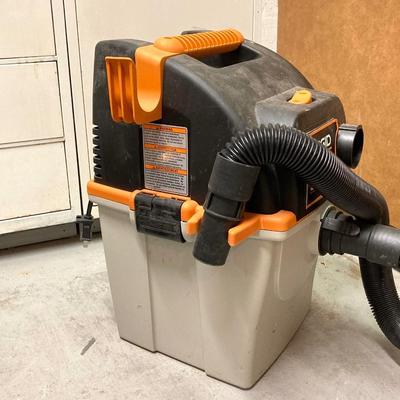 LOT 66U: Ridgid Stor N Go Vacuum Model WD5500 0, Eureka Powerline Mightymite Vacuum Model 3673 and Vacuum Bags