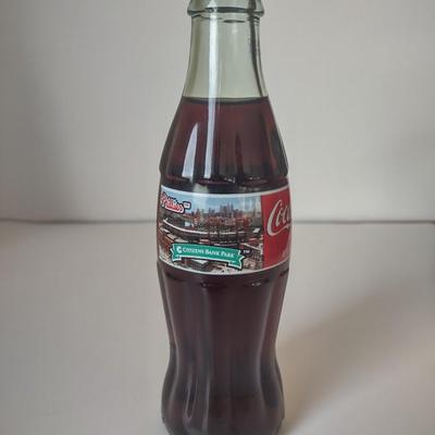 LOT 101K: Classic Coca Cola Bottles and Miniature Lunch Metal Pail