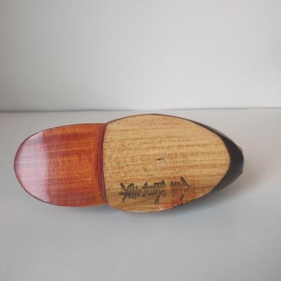 LOT 102K: Signed Wooden Mallard Ducks and Otter Paper Weights along with a Vintage Cast Iron Flying Pig