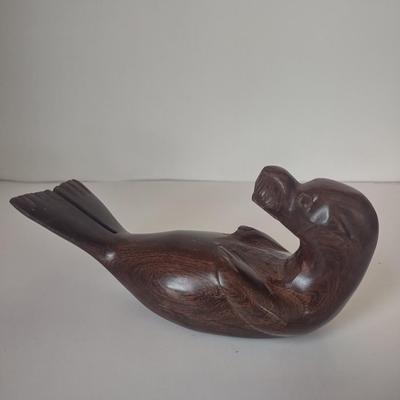 LOT 102K: Signed Wooden Mallard Ducks and Otter Paper Weights along with a Vintage Cast Iron Flying Pig