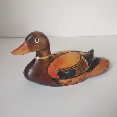 LOT 102K: Signed Wooden Mallard Ducks and Otter Paper Weights along with a Vintage Cast Iron Flying Pig