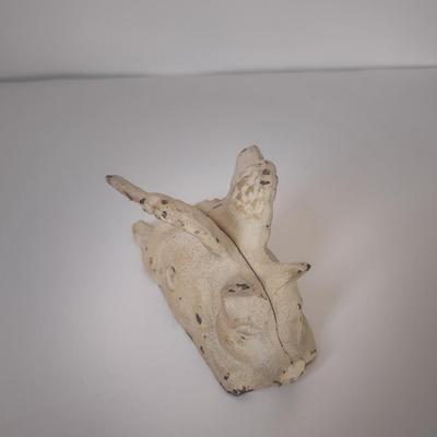 LOT 102K: Signed Wooden Mallard Ducks and Otter Paper Weights along with a Vintage Cast Iron Flying Pig