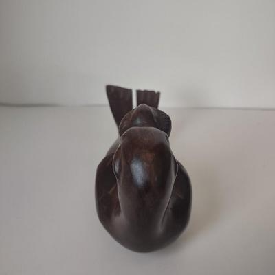 LOT 102K: Signed Wooden Mallard Ducks and Otter Paper Weights along with a Vintage Cast Iron Flying Pig