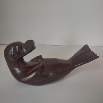 LOT 102K: Signed Wooden Mallard Ducks and Otter Paper Weights along with a Vintage Cast Iron Flying Pig
